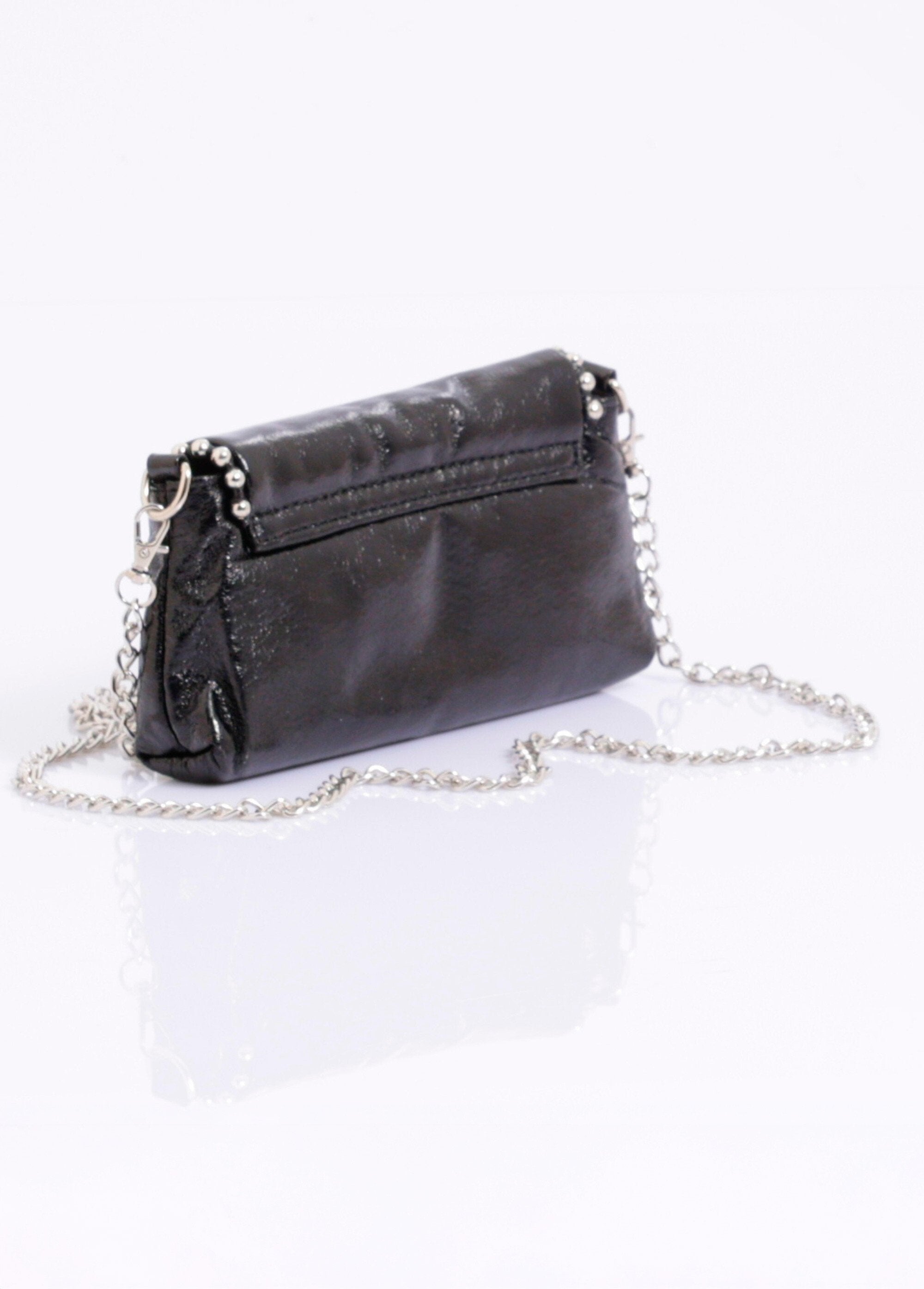 Bolso_de_mano_con_detalles_de_perlas_metálicas_Negro_DO1_slim